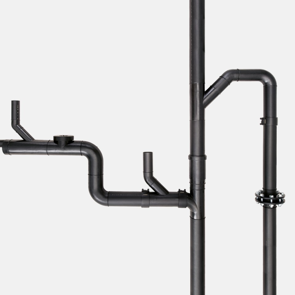 A Geberit PE pipe installation with various fittings, pipe dimensions and connection technologies