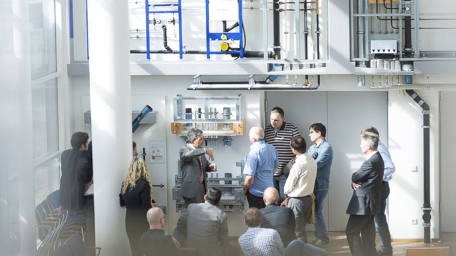 People at a Geberit training course